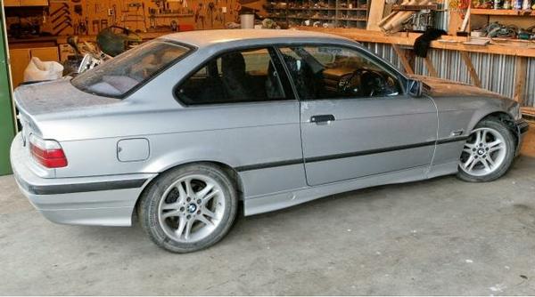 The silver BMW owned by Frandi.