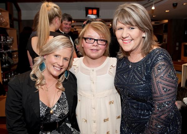 Josie Spillane (L) and Vicki Lee (R) of Cure Kids with Cure Kids Ambassador Sophie Newbold (centre).