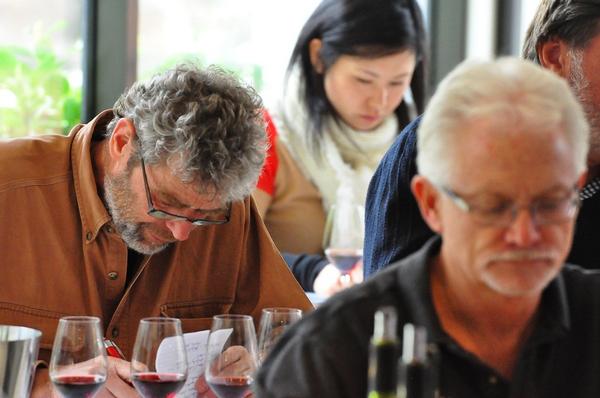 Legendary Gibbston Valley winemaker Grant Taylor samples Pinot Noir at the Grand Vertical Tasting event.