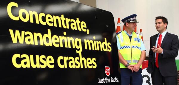 NZ Police Western Bay of Plenty Area Commander inspector Clifford Paxton and Local MP and Associate Minister for Transport Simon Bridges discuss the new "Just the Facts" signage that will be installed on the Kaimais this week.  