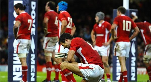 Mike Phillips cuts a dejected figure after Kurtley Beale's try for Australia at the death.