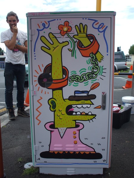 Members of the Underwater Collective admire their Adopt-a-Box on the corner of Grey and Clyde Streets