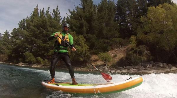 Tony Bain on a SUP on the Hawea River while visiting back in New Zealand last year. He can't wait to tackle the Waimakariri River on a stand up paddle board as part of the two day Kathmandu Coast to Coast event