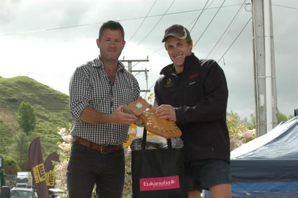 Eukanuba Shepherds' Shemozzle 2016 Winner Nick Tipling being presented plaque by Eukanuba Farm Representative Huw Taylor