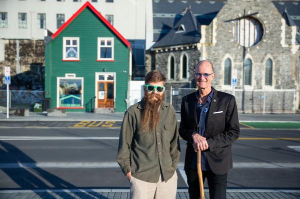 Abe Gray and Michael Mayell in front of Shands and Trinity Church, Christchurch