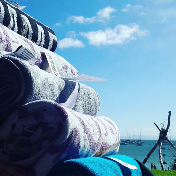 Extra-large beach towels from New Zealand-based Towelling it makes the perfect corporate gift.
