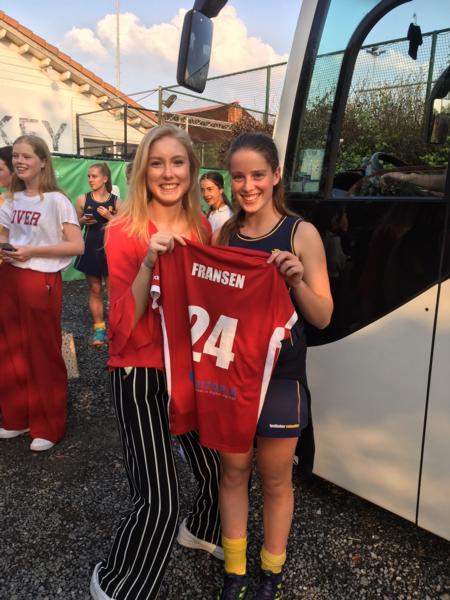 Swapping jerseys Rangi Ruru's Claudia Reid (on right) with her Antwerp U19 team opposite