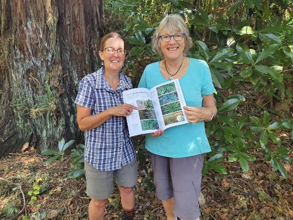 TRC's Leigh Honnor (left) and author Janet Hunt with a copy of the new booklet.