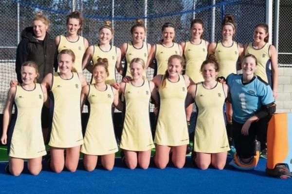 Rangi Ruru's 1st IX Hockey Team: Anneka is beside the goalie (in the blue).  Abby is behind the goalie on the end of the row, and Britt is beside her.