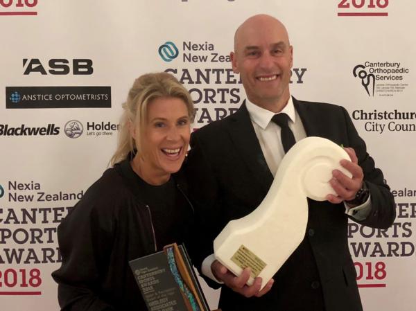 John McKenzie and Angela Richards from enthuse media & events on the red carpet with their sports event of the year trophy at the Nexia New Zealand Canterbury Sports Awards