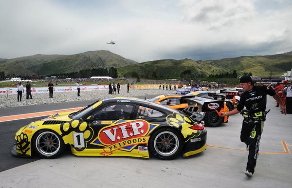 Star Kiwi driver Craig Baird shows his speed on foot during the Le Mans-style start of the Highlands 101 race, with the race format now being used for an Australian GT Championship race for the first time.