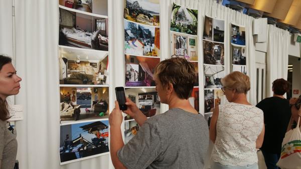 Tourists Visit Earthquakes and Butterflies Exhibition