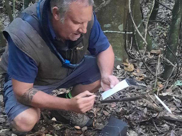 Nick Heslop checking card