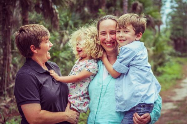 Happy family with 2 mums