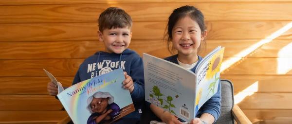 Children enjoying colorful storybooks that spark joy and imagination.