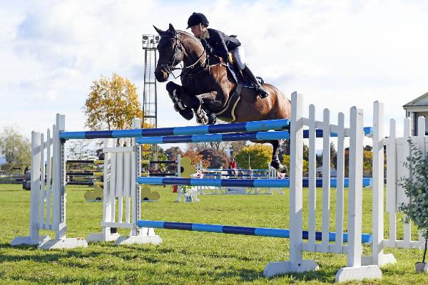 Tegan Fitzsimon and Windermere Cappuccino flying to victory in the POLi Payments Premier League Series at the Glistening Waters Series Final Show in Masterton.