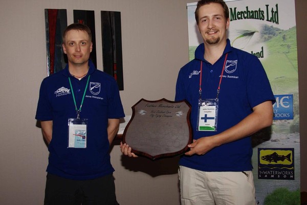 The Finnish team members who took first and third places in the NZ National Open Fly Tying Champs: Jarkko Suominen (holding the shield) and Janne Pirkkalainen