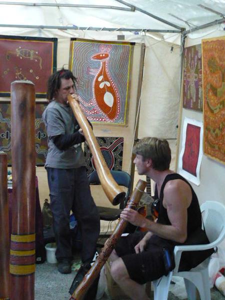 Trying out didgeridoo and admiring Aboriginal Art