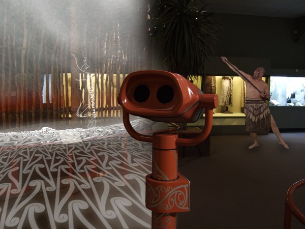 The digital binocular station situated in Canterbury Museum�s Ng� Taonga gallery, with an example of the augmented reality animation in the background.