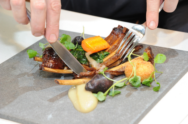 Judges try the winning dish