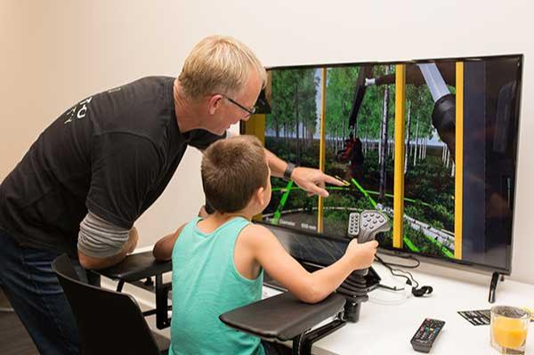 Linton Winder demonstrates the latest in forestry simulation technology. 