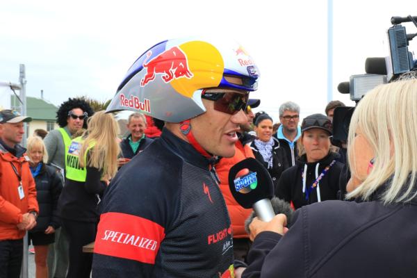 NZME's Lesley Murdoch interviews Coast to Coast One Day World Championship winner Wanaka athlete Braden Currie at the finish line in the Christchurch seaside suburb of New Brighton 