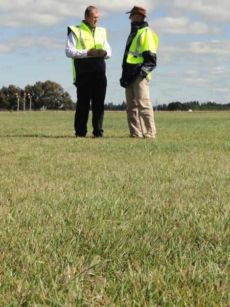 Andy Lester, Chief Operating Officer for CIAL on the left, with AgResearch scientist Chris Pennell