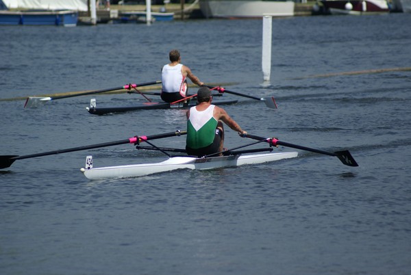 Wairau sculler Duncan Grant (green) leads the reigning Diamond Sculls champion Ian Lawson on his way to victory in his first round race today