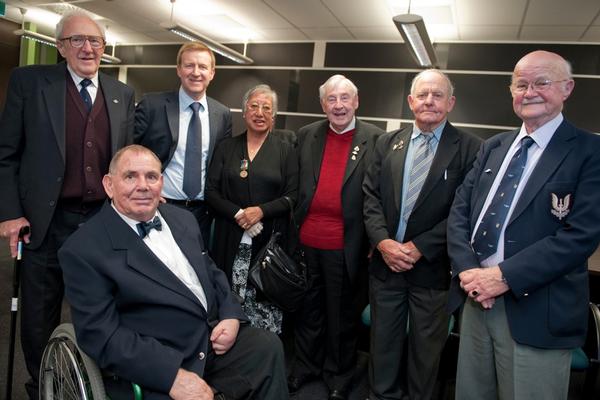  In front Cpl Hugh Fraser (from Wellington). Rear left to right &#8211; Graeme Brighouse (Auckland), Dr Jonathan Coleman, Mrs Harriet Fowler (Johnsonville), Ron Henderson (Canberra), Neville Howse, (Queenstown) and Bruce Craig (Greytown).