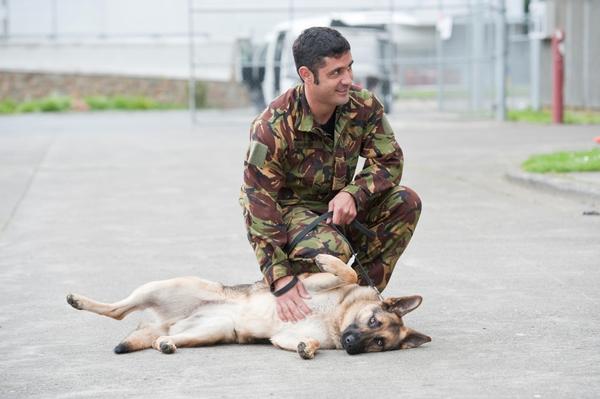 Dog handler Corporal Mark Barker and Cougar.  
