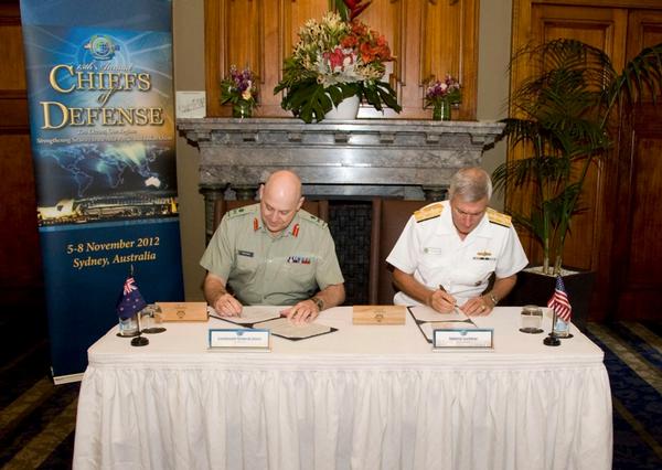 U.S. Pacific Command, Adm. Samuel J. Locklear III and the Chief of Defence Force, Lieutenant General Rhys Jones, sign the treaty-level Acquisition and Cross Servicing Agreement (ACSA).