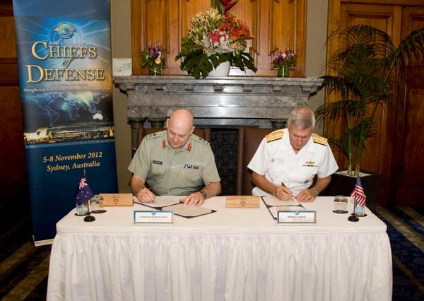 U.S. Pacific Command, Adm. Samuel J. Locklear III and the Chief of Defence Force, Lieutenant General Rhys Jones, sign the treaty-level Acquisition and Cross Servicing Agreement (ACSA).