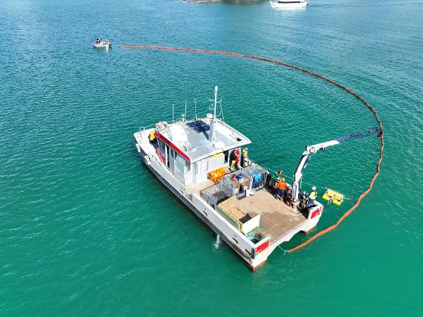 Drone footage of NRC vessels deploying booms to contain a fictional oil spill off Tutukaka Thursday 27 April