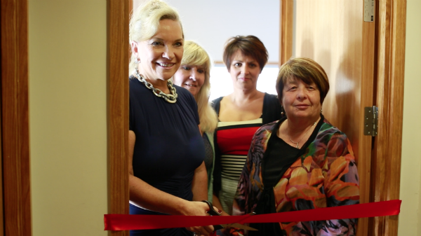 Propellor Property Investments owner Nikki Connors cuts the ribbon to make their Ronald McDonald House room sponsorship official