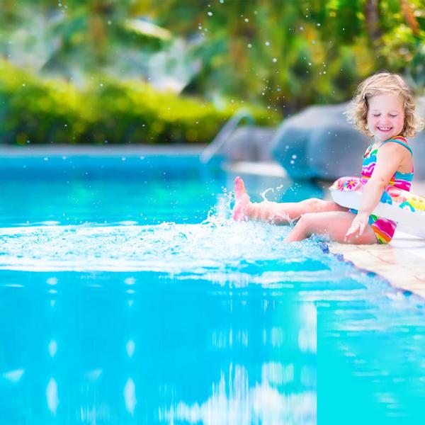 Little girl at swimming pool