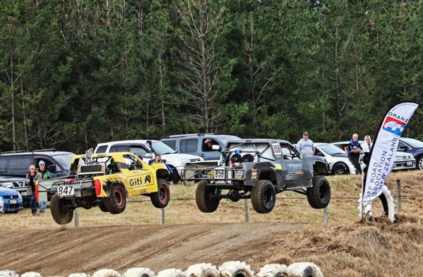 Bryan Chang, left, flies alongside Bruce McKenzie as the first race begins