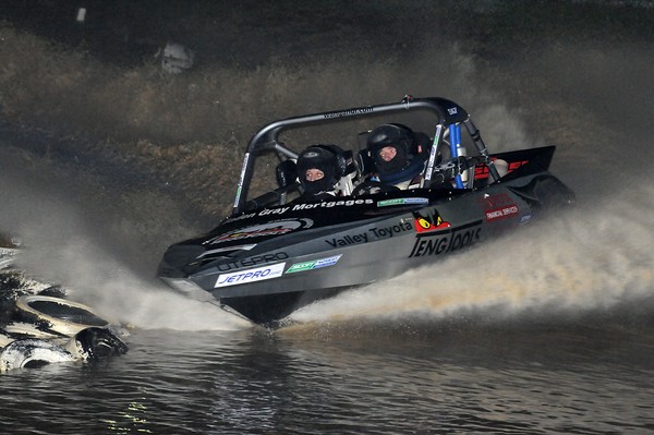 Auckland's Baden Gray and Tanya Iremonger had an anxious wait to be confirmed winners of the Jetpro Jetsprint championship round held under lights, taking his fourth win for the season in the Scott Waterjet Group A class.