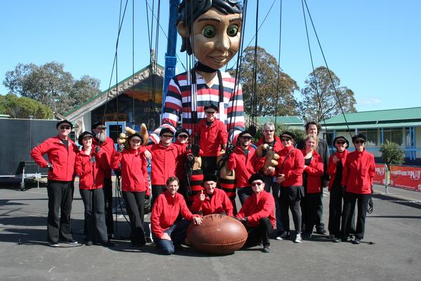 Junior with his entourage of puppeteers and helpers.