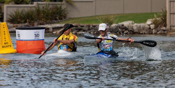 Richard Ussher (right) leads Australian veteran John Jacoby during the kayak leg of the Australasian Multisport race at the Expand-A-Sign 3D festival in Rotorua