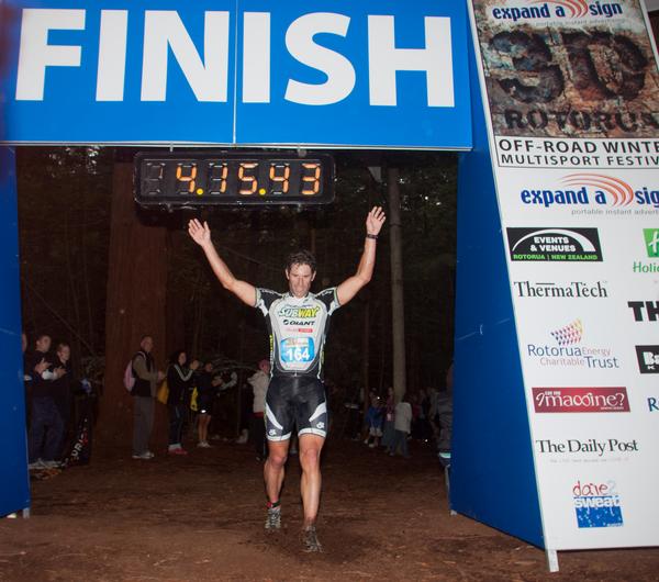 Richard Ussher celebrates his second win in the Australasian Multisport race at the Expand-A-Sign 3D festival in Rotorua