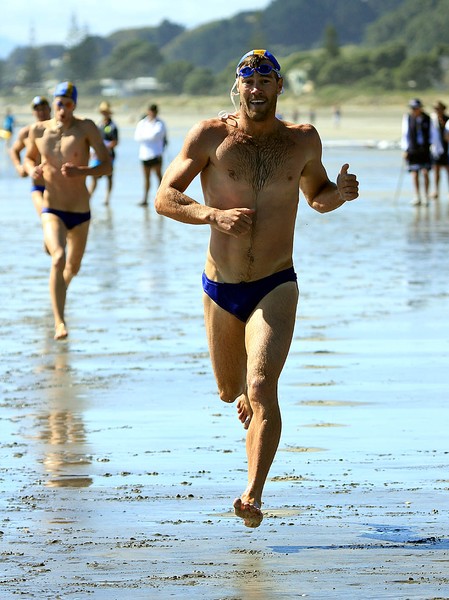 Glenn Anderson wins the men's run-swim-run title.