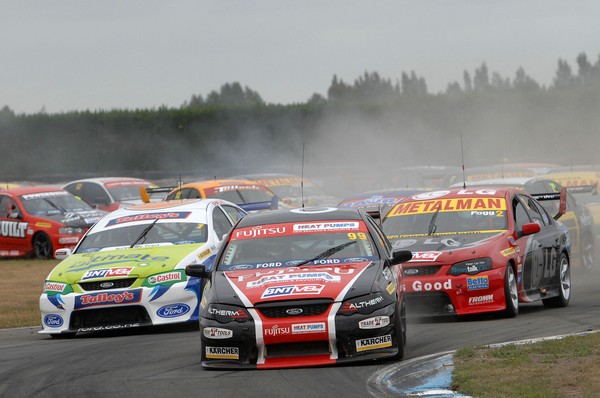 The opening corner of race one in Timaru with Kayne Scott in the lead