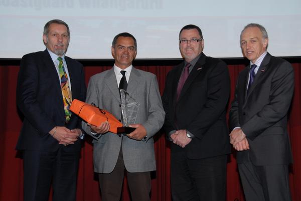 Coastguard Whangaruru volunteer Alex Wakefield is presented with the Coastguard Rescue Vessel Volunteer of the Year Award