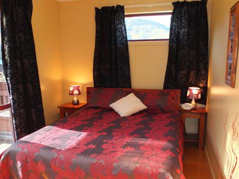 The bedroom of one of our luxury two bedroom suites