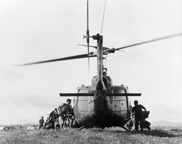 New Zealand infantry patrol boards a helicopter 