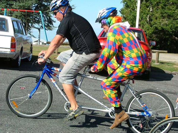 Stratford District Mayor John Edwards, riding a tandem bike with John Woodward from the 02 Project