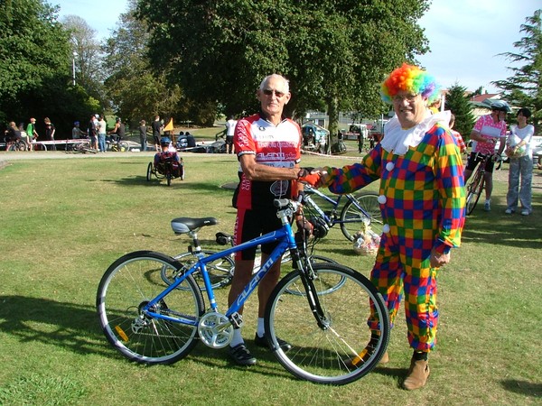 Bob Marsh with John Edwards. BobÃ¢â‚¬â„¢s wife Dawn won the bike pictured