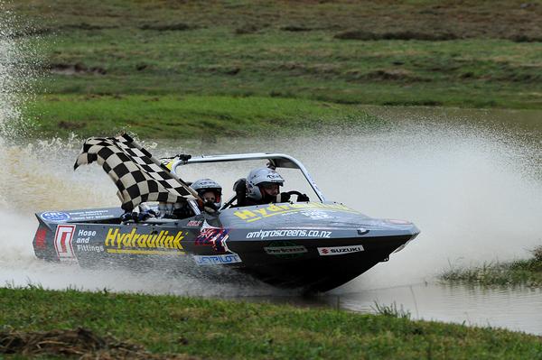 Wanganui's Leighton and Kellie Minnell carry the weight of the region on their shoulders as part of a campaign to promote the Wanganui.com World Series jet sprints that begins on 11 February.