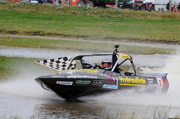 Wanganui's Leighton and Kellie Minnell have won the opening round in the Superboat category of the Wanganui.com World Series jet sprint championship near Featherston.