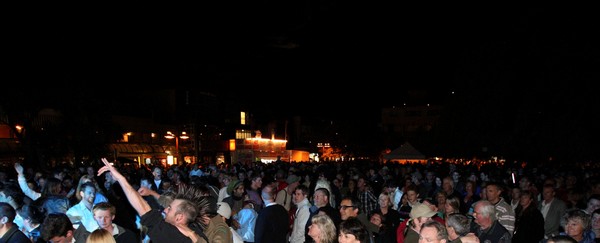 Crowd enjoying New Year's Eve celebrations and fireworks display in Queenstown